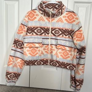 SO “Brand” blue, coral and brown pattern fleece with pockets.